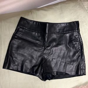 Black leather shorts